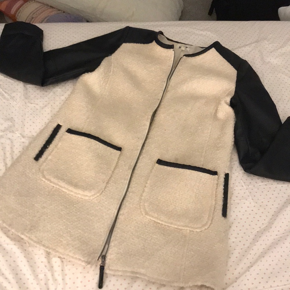 Formal coat with leather sleeves